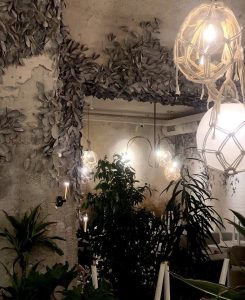 Large-scale 3D sculptural installation with integrated lighting and painted wall art for Dubai commercial venue